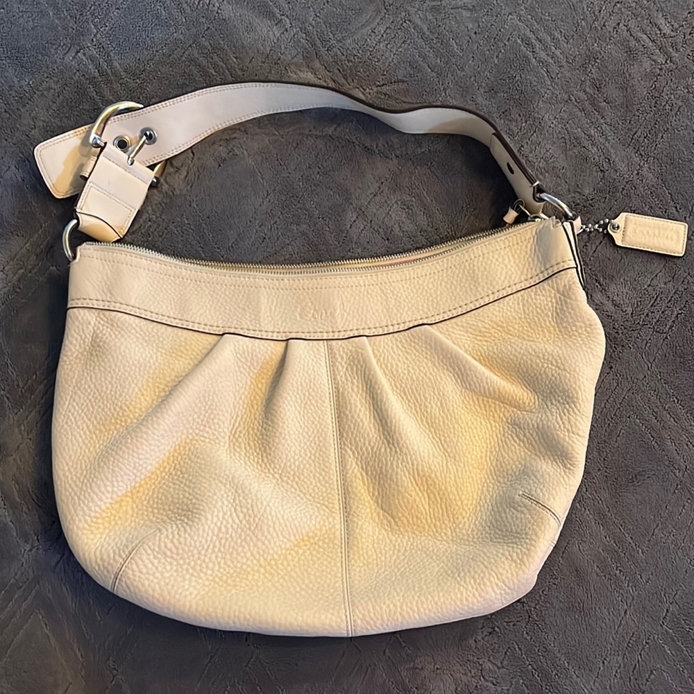 Cream colored coach bag